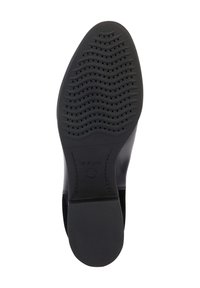 La semelle noire de chaussure présente un design en caoutchouc texturé avec un motif ondulé et des trous de drainage, étiquetée avec le nom de la marque Geox.
