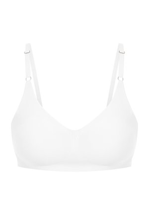 Soutien-gorge sans fil blanc avec un tissu lisse, des coutures minimales, un design en V, des bretelles fines et réglables, et un matériel en métal pour l'ajustement.