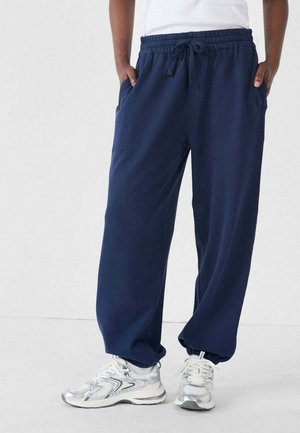 MARINE GILL - Pantalones deportivos - azul
