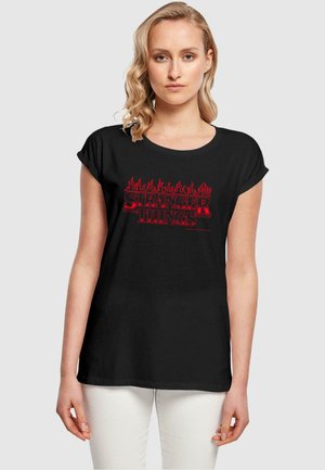 STRANGER THINGS - FLAMES - Print T-shirt - black