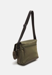 Guess CERTOSA UNISEX - Torba preko tijela - army green