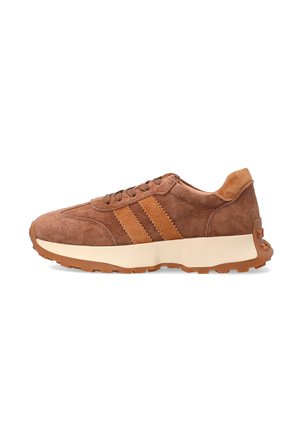 Brown suede athletic shoes with two diagonal orange stripes, white midsole, and textured brown rubber outsole. Laced design with padded collar.