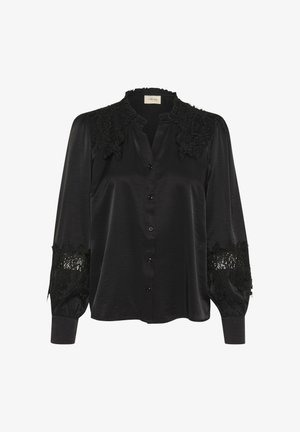 Schwarze Bluse mit einem Rüschkragen, Knopfleiste und langen Ärmeln. Mit Spitzendetails an den Schultern und den Bündchen. Aus glattem, leichtem Stoff.