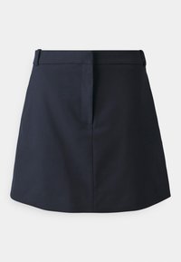 Mørkeblå a-linjeet skjørt laget av glatt stoff, med en subtil fold foran og en tettsittende midje. Nederkanten er noe buet.