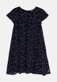 Robe marine avec manches courtes, encolure ronde et motif d'étoiles blanches. Coupe fluide avec fronces au niveau de la poitrine, tissu léger.