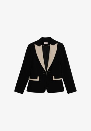 Zwarte blazer met contrasterende beige revers en zaktrim. Heeft een getailleerde pasvorm, twee knopen aan de voorkant en gestructureerde schouders.