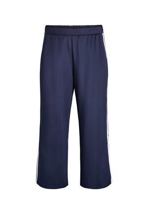 Mornarsko modre športne hlače z elastičnim pasom, z belimi stranskimi črtami in ohlapnim, skrajšanim dizajnom. Gladka tekstura.