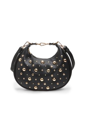 Sac à main noir en forme de croissant avec des clous dorés arrondis et une bandoulière réglable.