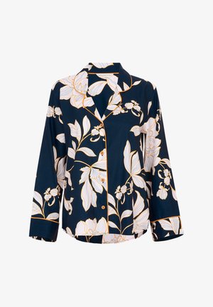 Navyblauwe blouse met lange mouwen, bloemenpatroon in wit en oranje. Voorzien van knoopsluiting aan de voorkant, een opstaande kraag en contrasterende afwerking.