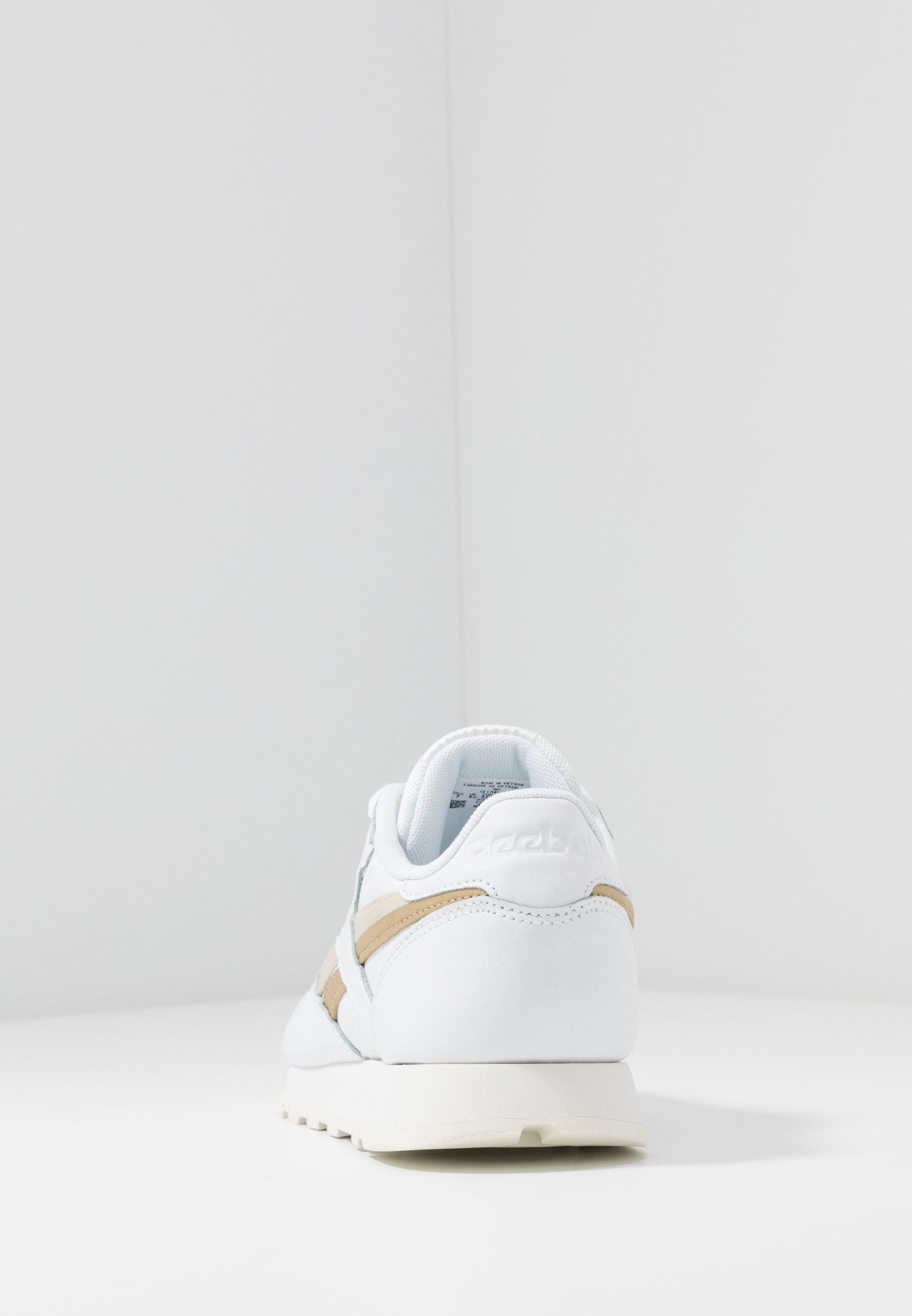 reebok beige trainers