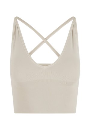 Beige ribbattu tanktoppi, jossa on syvä V-pääntie ja ristikkäiset takahihnat. Pehmeä ja joustava materiaali lisää mukavuutta ja istuvuutta.