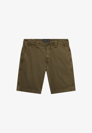 Bruine casual shorts met riemlussen, knoopsluiting, voorzakken en een label aan de binnenkant van de tailleband.