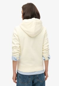 Superdry & Co ESSENTIAL mleczny