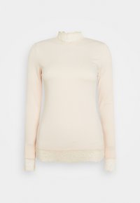 Lys rosa langermet topp med ribbestruktur, med høy blondekrage og blondekant på ermene og nederkanten.