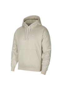 Beige hoodie med dragsko-huva, framficka och ribbade ärmslut. Har en liten vit logotyp på bröstet. Mjuk, strukturerad fabrik.