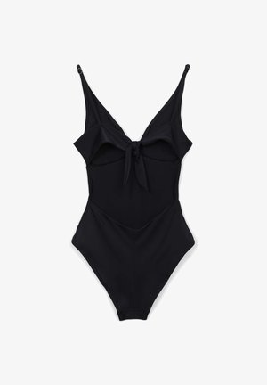 Costume da bagno intero nero con spalline regolabili, dettaglio arruffato sul davanti e un fiocco decorativo sul busto, realizzato in un tessuto liscio ed elastico.