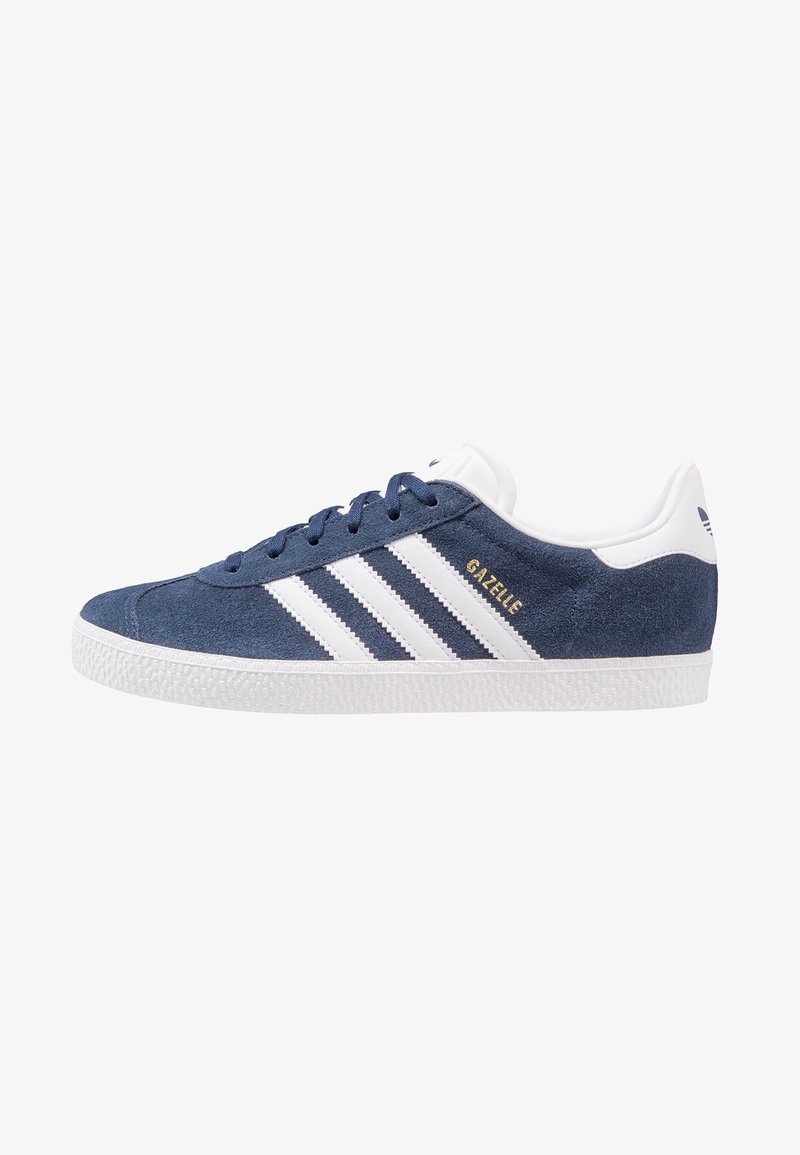 Navy blue suede sneaker with white rubber sole and three white stripes. Features a cushioned tongue and branded detailing in gold.