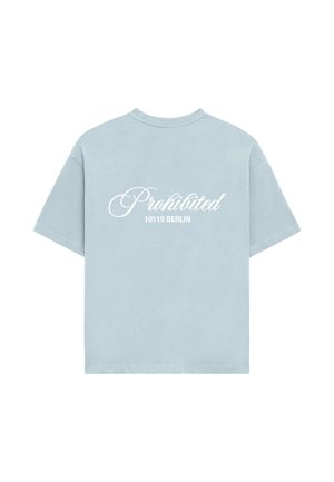 Light blue cotton t-shirt with short sleeves. "Prohibited" and "10119 BERLIN" printed in white cursive and block fonts on the back.