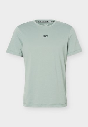 Light green short-sleeve crew neck t-shirt with small black Reebok logo centered on front and branded collar lining.