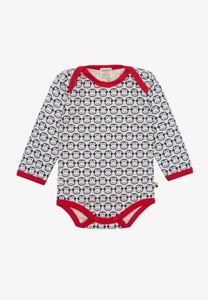 Lange mouw baby rompertje in crème met een marineblauwe aapjesprint, rode manchetten en halslijn. Drukknoopsluiting aan de onderkant. Zacht katoenmateriaal.