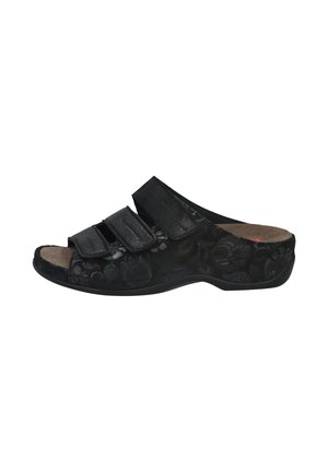 Black open-toe sandal with floral texture, three adjustable Velcro straps, cushioned insole, and a low, contoured heel.