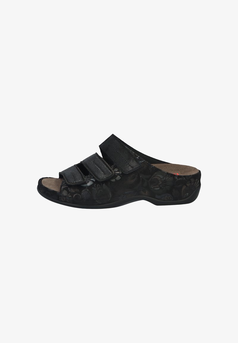 Black open-toe sandal with floral texture, three adjustable Velcro straps, cushioned insole, and a low, contoured heel.