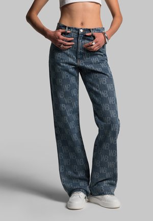 Wide-leg denim jeans with a faded blue wash, featuring a repeating light blue logo pattern, classic five-pocket design, and metallic button closure.