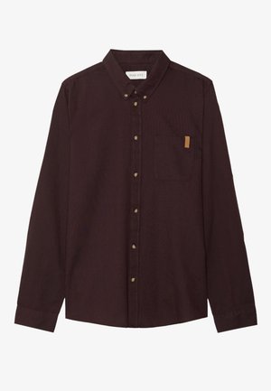 Burgundyröd långärmad skjorta med knappar. Tillverkad av textil med struktur, med en ficka och brun etikett som detalj. Har gyllene knappar och en klassisk krage.