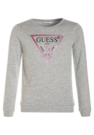 Felpa grigia a maniche lunghe, con un logo a triangolo rosa scintillante al centro con la scritta nera "GUESS" e "U.S.A.".