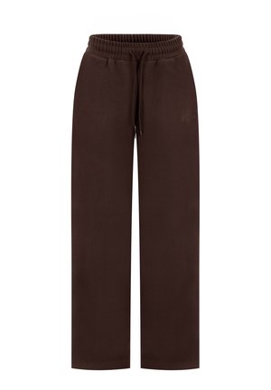 Pantalon de survêtement marron foncé à jambes larges avec ceinture élastique et cordon de serrage, orné d'un détail brodé subtil sur la cuisse gauche.
