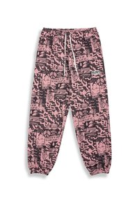 Pink sweatpants featuring an all-over graphic print with black elements, elastic waistband, and cuffs. Drawstring detail at the waist.