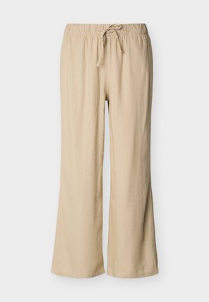 Béžové kalhoty s širokými nohavicemi, elastickým pasem a předním šněrováním, vyrobené z lehké látky.