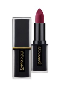 Tubetto di rossetto nero con accenti dorati, dotato di una punta di bullet bordeaux. Texture liscia, forma rettangolare e logo del marchio visibile.