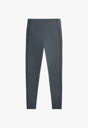 Mörkgrå tights med figurnära passform, texturerade sidopaneler och hög midja, designade för atletisk eller avslappnad användning.