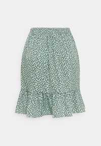 Falda verde menta con lunares negros, cintura elástica, dobladillo con volantes, tejido ligero y diseño hasta la rodilla.