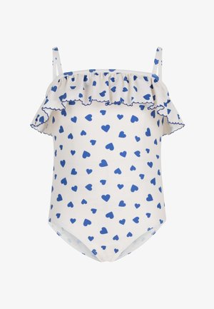 Maillot de bain blanc avec motif de cœurs bleus, encolure froncée et fines bretelles réglables. Fabriqué en tissu extensible, il comprend une finition à bords festonnés.