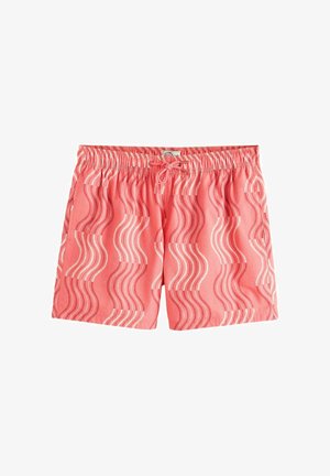 Shorts de bain corail avec une ceinture élastique, un cordon de serrage et un motif à rayures verticales ondulées rose et blanc.