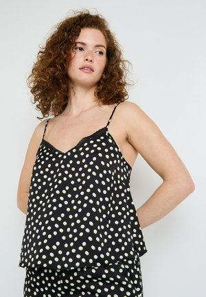 Camicetta nera caratterizzata da una vestibilità ampia, sottili spalline e pois bianchi e verde chiaro. Dettagli in pizzo lungo il collo aggiungono eleganza.