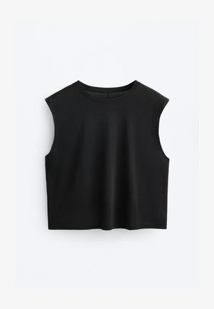 Haut court noir sans manches avec un col rond, présenté à plat sur un fond blanc.