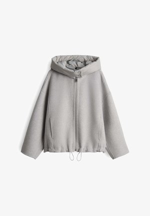 Light gray zip-up jacket with wide sleeves and a padded stand-up collar featuring snap buttons, displayed on a white background.