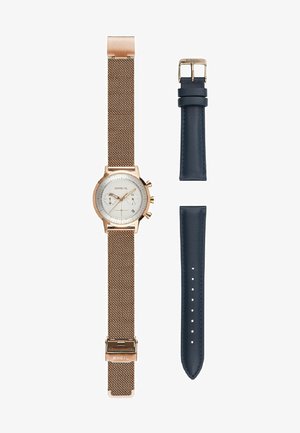Rose-guld metalur ure med mesh rem, hvid urskive og tre sub-skiver; inkluderer en ekstra marineblå læderrem.