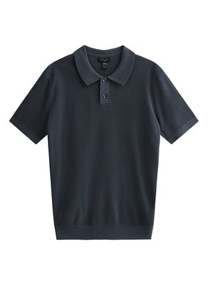 Ciemnogranatowa koszulka polo z krótkim rękawem wykonana z teksturowanej tkaniny, z dwoma guzikami na plisie oraz ściągaczami na kołnierzyku i mankietach.