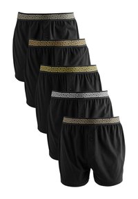 Schwarze Boxershorts mit gemusterten elastischen Bund in Gold, Silber, Schwarz und Dunkelbraun, die in einer Reihe angeordnet sind.
