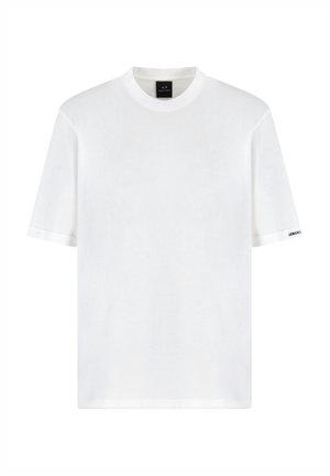White short-sleeve T-shirt with a round neck, made of soft cotton. Features a clean design and a subtle logo on the sleeve.