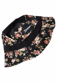 Cappello a secchiello nero realizzato in tessuto di cotone, con un motivo floreale in tonalità di rosa e beige su sfondo nero. Include un'etichetta nera.