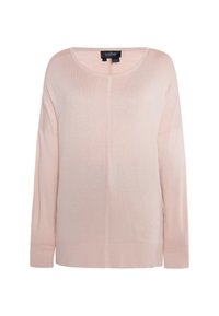 Maglione oversize rosa chiaro a maglia con maniche lunghe, collo tondo, polsini e orlo a coste, caratterizzato da una leggera trama. Etichetta del marchio visibile.