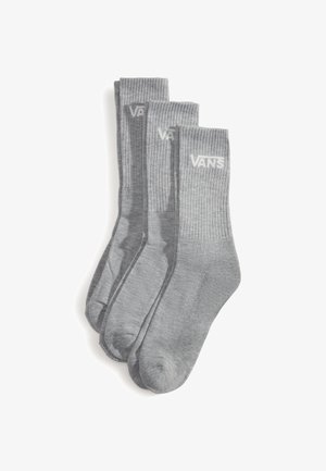 Calcetines de algodón grises en un paquete de tres. Diseño acanalado con el logo blanco "VANS" cerca del puño. Textura suave y altura hasta la mitad de la pantorrilla.