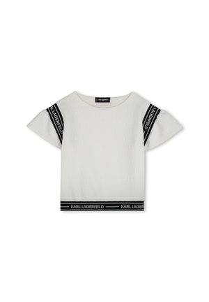 Haut blanc à manches courtes avec un motif texturé, finition de marque noire sur les manches et l'ourlet inférieur. Coupe décontractée, encolure ronde.