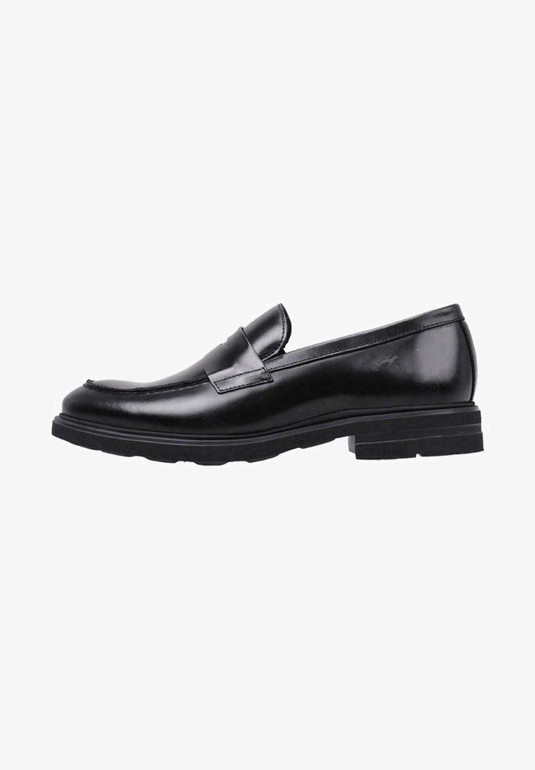 Mocasines de cuero negro con punta redonda, costuras visibles y suela de goma baja. Textura suave con un diseño elegante.
