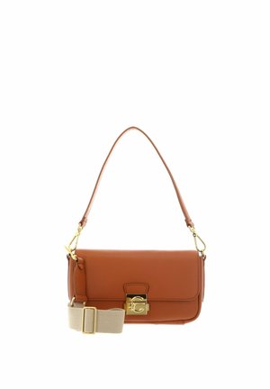 Brown leather shoulder bag with gold clasp and detachable beige adjustable fabric strap on white background.